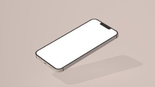 ベージュ背景に置かれた画面が白紙のスマートフォンのモックアップ写真